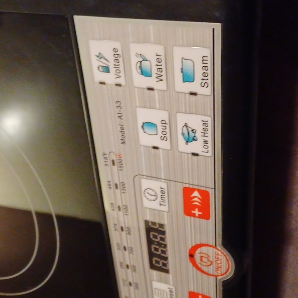 Push button induction cooker - Picture 4 of 11